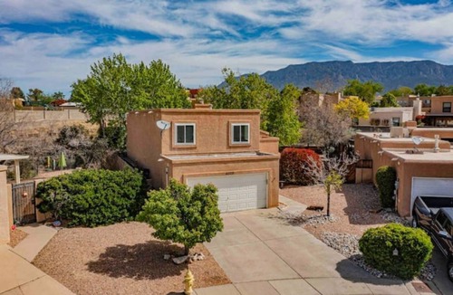 Oso Grande House | Charming 3 bedroom, with an incredible backyard.