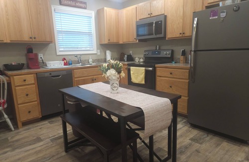 Mena House | Charming little home located in the heart of Mena.