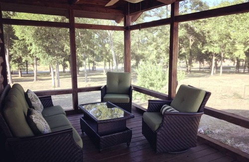 Prairie Lea Cabin | Charming Log Cabin in Texas - Perfect Glamping Vacation on the San Marcos River near Kingsbury