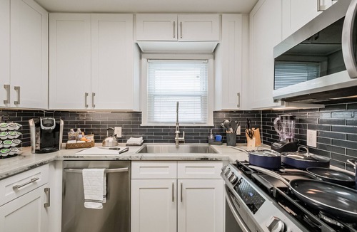 Shady Acres House | Charming private home sleeps 6 in the Heights near Downtown with fast WiFi, smart TVs, ample parking, and a primary king bed for a comfortable stay.