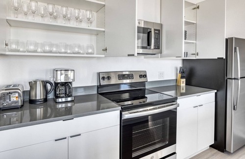 West Colfax Apartment | Chic Sloan's Lake 2BR w/ Gym, W/D & Roof Deck, near Park, by Blueground
