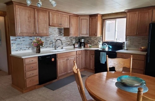 Twin Lakes House | Classic Waterfront Lake House in Northern Idaho; Dock, Beach & Sunset Views