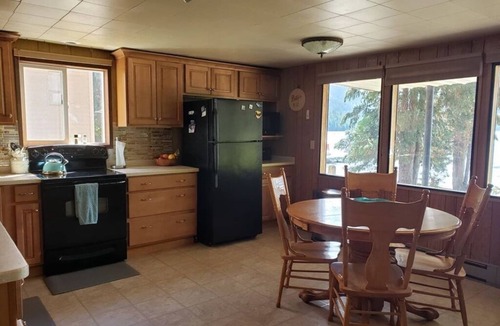 Twin Lakes House | Classic Waterfront Lake House in Northern Idaho; Dock, Beach & Sunset Views