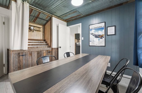 Westworth Village House | Cleared for Landing: The Pilot's Lounge. 4BR TV Every Bedroom Exterior Patio