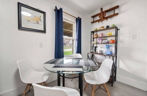 Westworth Village House | Cleared for Landing: The Pilot's Lounge. 4BR TV Every Bedroom Exterior Patio