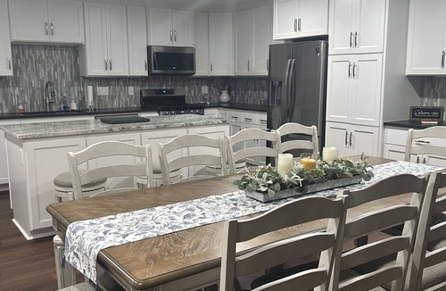 Bryan House | "Colonel". Spacious open concept. Fresh fun and comfortable for all.