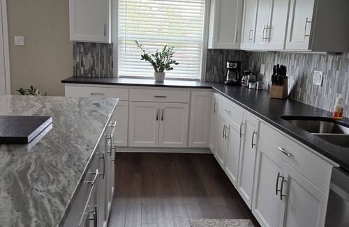 Bryan House | "Colonel". Spacious open concept. Fresh fun and comfortable for all.