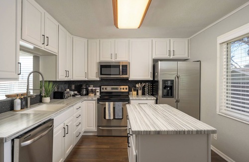 Arvada House | Colorado Getaway: Movie Theater, Hot Tub, Game Room, Huge Fenced-in Yard
