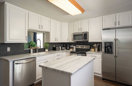 Arvada House | Colorado Getaway: Movie Theater, Hot Tub, Game Room, Huge Fenced-in Yard