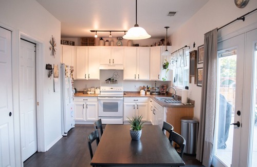 Brighton House | Comfortable home on quiet street with a large backyard, close to DIA