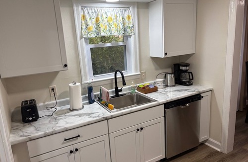 Lawrence House | Comfy family home with parking! Close to KU & Mass St