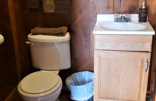 Cleburne Cabin | Cowboy Hotel in Western Town w/Saloon & Firepit!