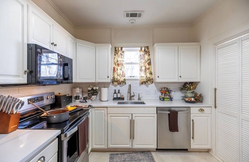 Sayles Blvd. Area House | Cowboys and Fairytales — Movie Theater & Games!