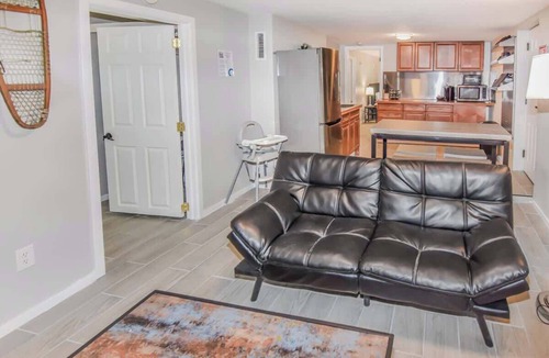 Southeast House | Cozy basement space with 2 bedrooms and kitchenette