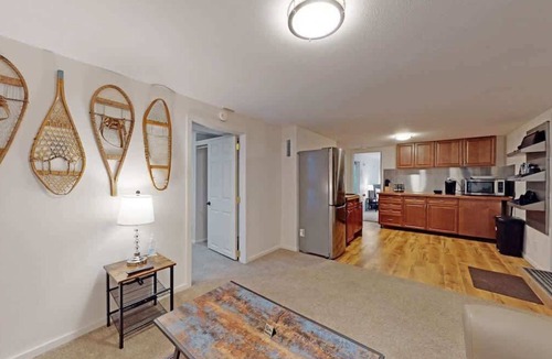 Southeast House | Cozy basement space with 2 bedrooms and kitchenette