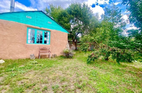 San Cristobal Cabin | Cozy Cabin Suite with Orchard Views near Taos, New Mexico