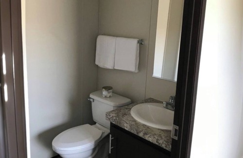 West Odessa Hotel | Cozy Efficiency in Odessa with Pool, Laundry, Fishing Pond and Gym