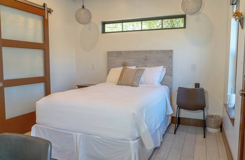 Muenster Bed & Breakfast | Cozy German-inspired 1BR retreat for 2 with private bath, kitchenette, patio, workspace, Wi-Fi, and breakfast vouchers. Perfect for romantic getaways, weekend escapes, or business stays in charming Muenster.