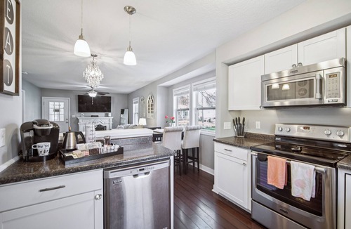 Des Moines House | Cozy Home Near Fairgrounds Patio-Gazebo-Fencing