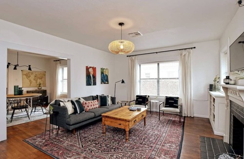 Austin Ave. Villa | Cozy Tudor Bungalow in Waco
