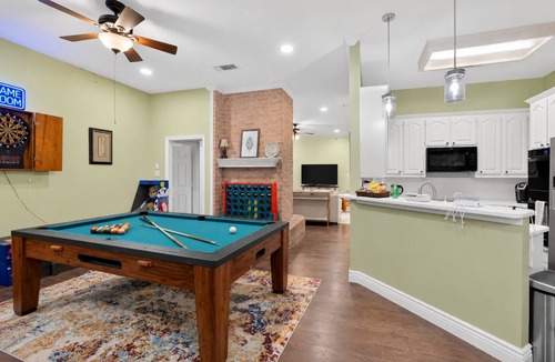 North Richland Hills House | DFW Family Fun Retreat Pool Table Air Hockey Arcade Game Work Space BBQ Firepit