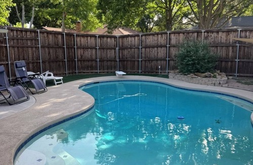 Lewisville House | Dive In! The Poolside Escape with a Hot Tub, Grill, Game Room & Good Times.