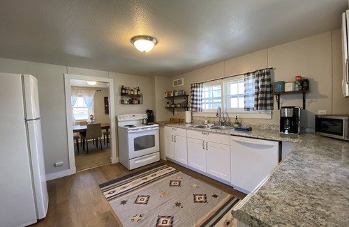 Historic Fort Collins High School Cottage | Dog Friendly with Private Fenced Yard, close to CSU and Old Town