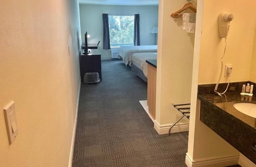 Cuero House | Double Queen With Kitchenette at FairBridge Inn & Suites Cuero, Free Parking!