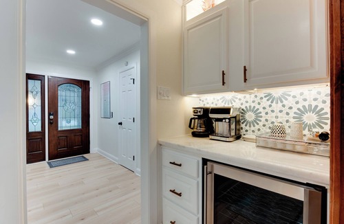 Spring Branch Central House | Durango is a centrally located Spring Branch home near Memorial City Mall, with quick access to Buffalo Bayou Park and The Galleria for outdoor fun, shopping, and dining. Enjoy a fully fenced outdoor retreat with a patio swing + fire pit, and foosbal