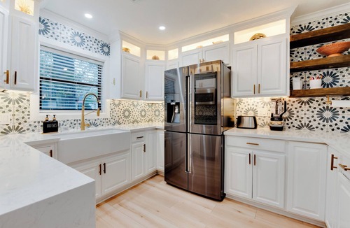 Spring Branch Central House | Durango is a centrally located Spring Branch home near Memorial City Mall, with quick access to Buffalo Bayou Park and The Galleria for outdoor fun, shopping, and dining. Enjoy a fully fenced outdoor retreat with a patio swing + fire pit, and foosbal