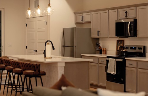 Ankeny House | Enjoy a stylish experience at this centrally-located newly built home.