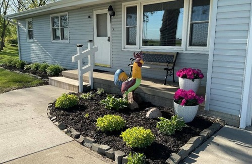 Altoona House | Enjoy golf course views with hot tub and fire pit. Three bedrooms, sleeps seven.