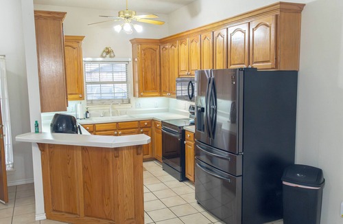 Gainesville House | Escape to Floral Cottage, a charming 3-bed, 2-bath retreat in Gainesville for up to 10 guests. This peaceful home in a quiet residential area features a private pool & spacious yard. Perfect for families or groups seeking a relaxing getaway