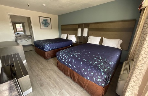 Beaumont Hotel | Executive Inn & Suites