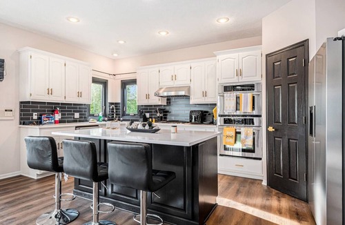 Omaha House | Executive Rental 5BR 5BA | Arcade, Bounce House, GYM, Grill