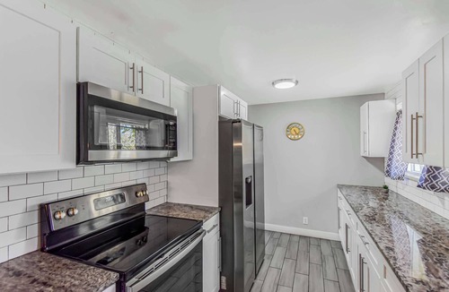 Littleton House | Expansive Centennial Home with Spacious Yard & Parking