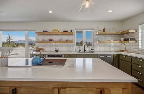 Timber Ridge Ranch House | Expansive home that sleeps up to 7 on 5 acres with stunning mountain views, chef's kitchen, hot tub, entertainment room, 2 car garage, and 2 Fireplaces.