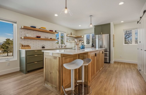 Timber Ridge Ranch House | Expansive home that sleeps up to 7 on 5 acres with stunning mountain views, chef's kitchen, hot tub, entertainment room, 2 car garage, and 2 Fireplaces.