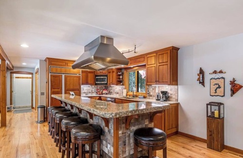 Clark Fork House | Expansive Riverfront Lodge with Dock, Game Room, Bar & Spacious Deck!
