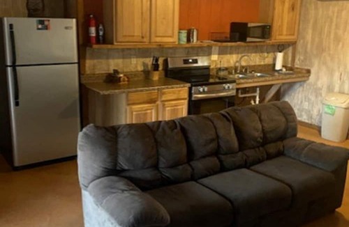 Paluxy Cabin | Family Cabin Getaway with an Outdoor Fireplace near Lake Granbury in Texas