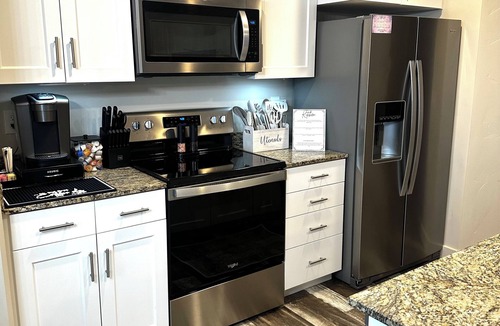 Rawlins House | Family Friendly Duplex Near I-80 - Game Room & Fenced Yard