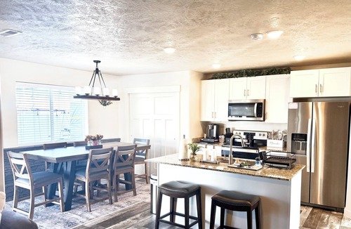 Rawlins House | Family Friendly Duplex Near I-80 - Game Room & Fenced Yard