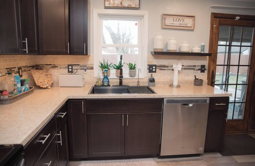 Huber Heights House | Fire Pit, Private Hot Tub + Workspace - Sleeps 7
