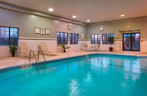 Peoria Condo | Free Breakfast. Pool & Hot Tub. Close to St. Francis Medical Center!