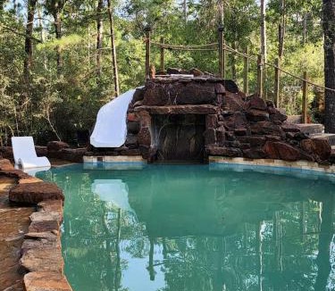 Waller House | Fun for All Ages: Treehouse with Waterfront Deck for Families in Grimes County, TX