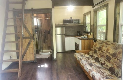 Waller Cabin | Fun for All Ages: Treehouse with Waterfront Deck for Families in Grimes County, TX