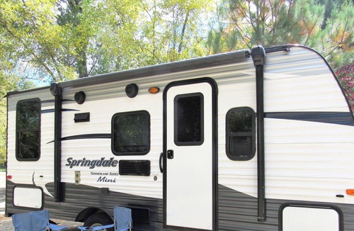 Lewis House | Glamper - Camper set up in a campground or on our property
