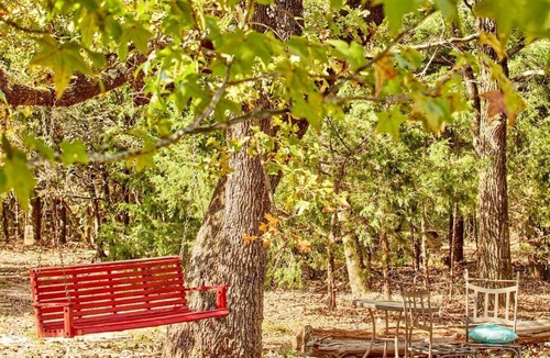 Van Zandt County Cabin | Gorgeous Multi-Unit Cabin Rental for Larger Groups Nestled in the Trees for an Unforgettable Getaway in Nature in Ben Wheeler, Texas