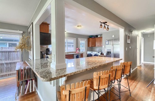 East Colfax House | Grey Brick Home Close to Central Park & Anschutz Medical Campus