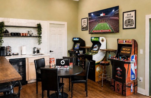 Olde Towne East House | Group Getaway with Game Lounge, Hot Tub, Arcades, Shuffleboard & Other Games